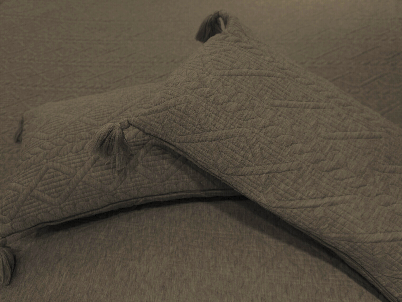 olive knitted bedcover | pillow view